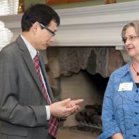 winner talks with person